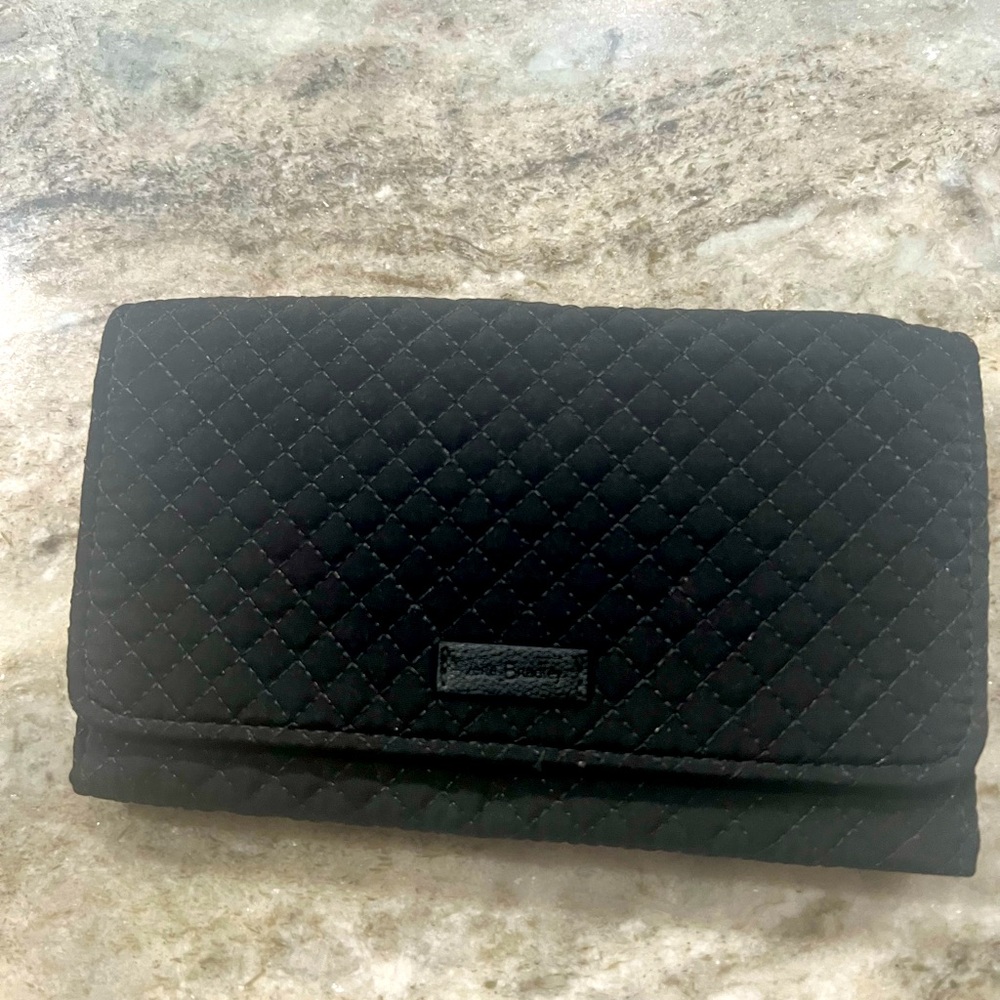 Vera Bradley black quilted wallet.
Barely used.
8”wide x 5”
